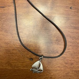 black and silver sailboat necklace